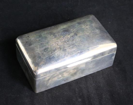 A George V silver cigarette box.